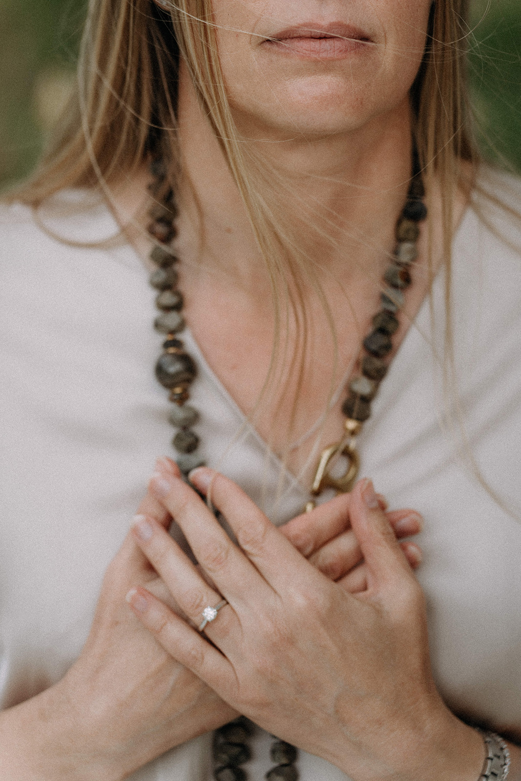 Päivi holding her hands over her heart